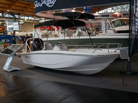 Boston Whaler center console on display at a boat show