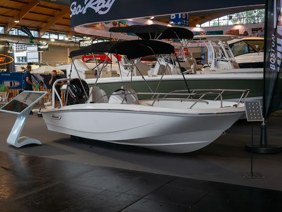 Boston Whaler center console on display at a boat show