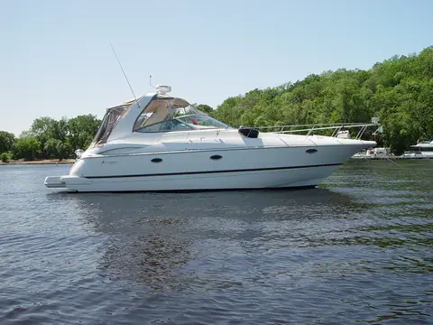 Cruisers Yachts 3672 Express anchored on the St. Croix River, Wisconsin