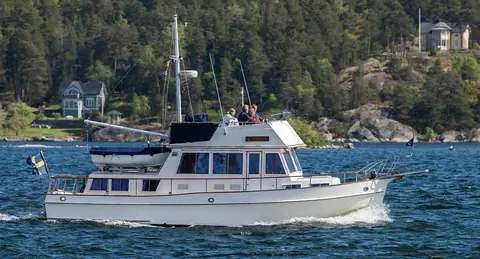Grand Banks trawler yacht under way near Vaxholm, Sweden