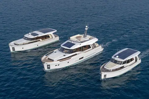 Aerial view of three Greenline hybrid yachts in the Bay of Piran