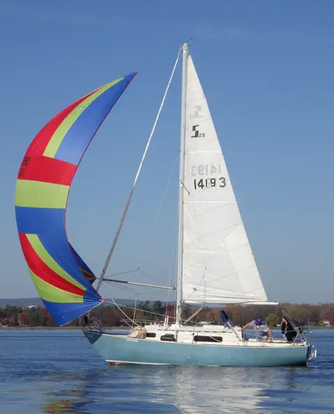 Sabre 28 Divine Wind flying its spinnaker