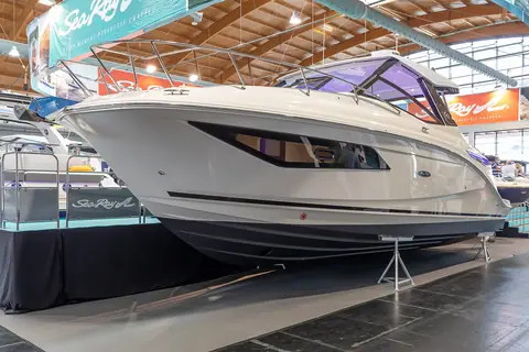 White Sea Ray Sundancer on display at a boat show
