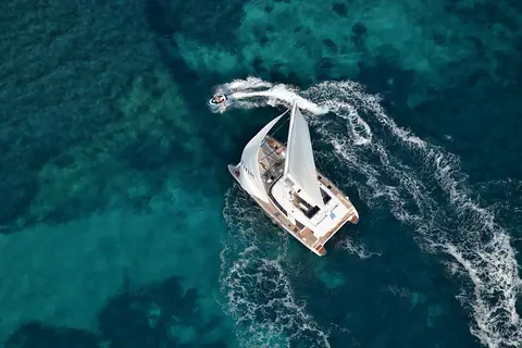 Aerial view of a Sunreef 60 Loft catamaran under sail