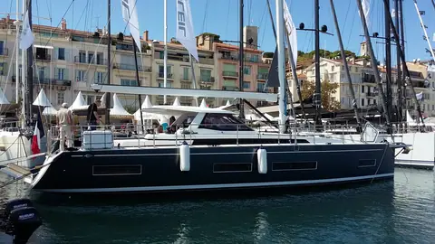 Dark hulled Amel 50 moored stern to at the 2017 Cannes boat show launch