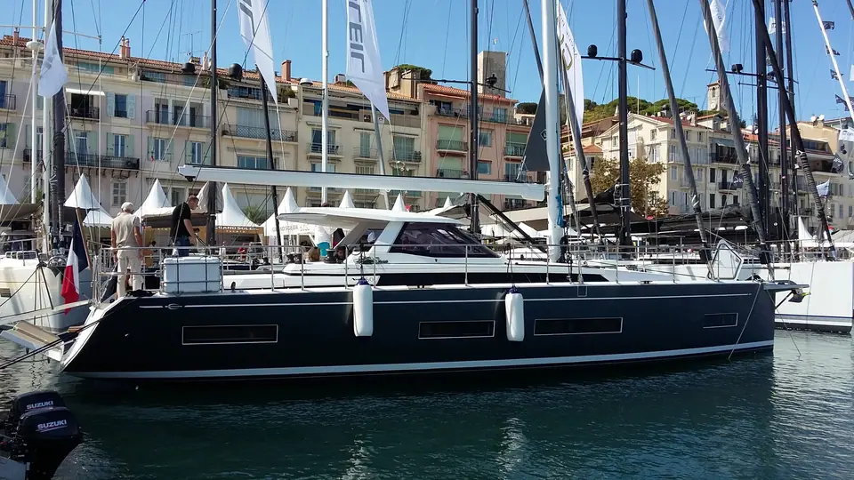 Dark hulled Amel 50 moored stern to at the 2017 Cannes boat show launch