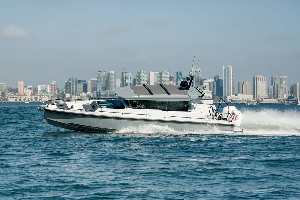 Axopar 37 XC Cross Cabin in profile showing the enclosed cabin and open bow seating