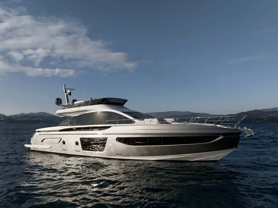 Azimut S7 in starboard profile showing its grey hull, long hull windows and small flybridge