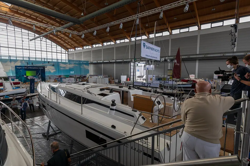 Cockpit and side deck of a Bavaria C42 at a boat show