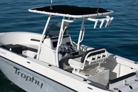 Bayliner Trophy T24CC seen from above showing the T top, helm seat and Trophy hull graphics