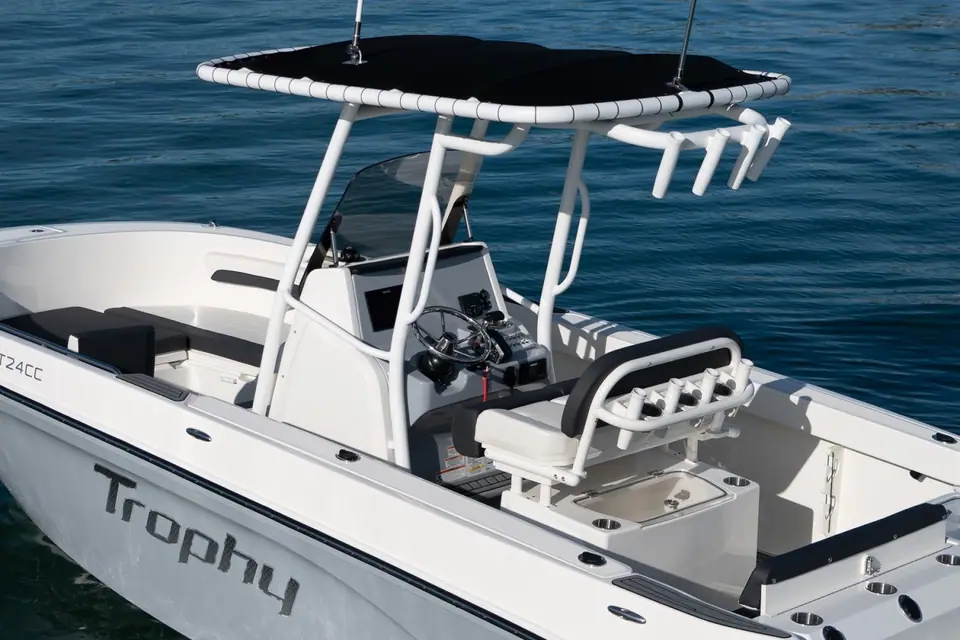 Bayliner Trophy T24CC seen from above showing the T top, helm seat and Trophy hull graphics
