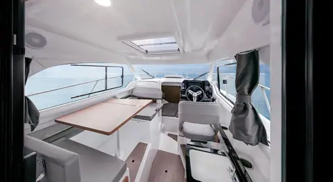 Beneteau Antares 8 wheelhouse with dinette, helm seat and sliding side windows