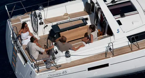 Beneteau Oceanis 45 cockpit with twin wheels, table and the hull name on the coaming