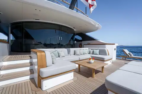 Benetti Oasis 40M Oreos main deck aft lounge with sofa and teak deck