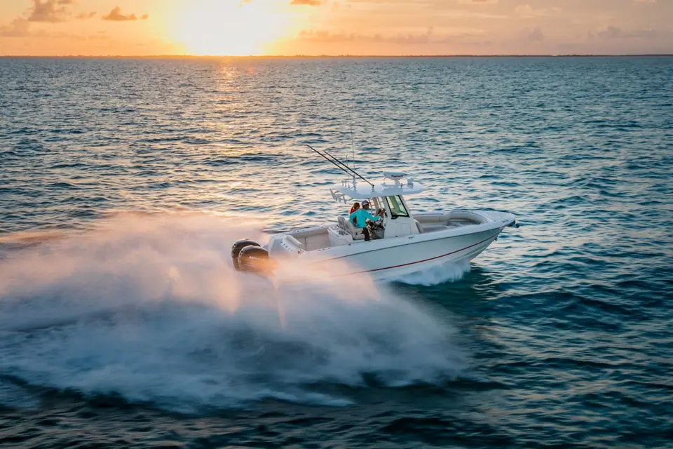 Boston Whaler 280 Outrage running at sunset