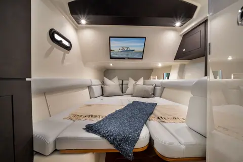 Cabin of the Boston Whaler 350 Realm with the berth made up