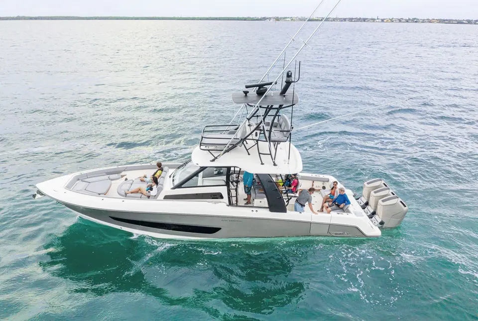 Boston Whaler 420 Outrage from above with guests in the bow and cockpit
