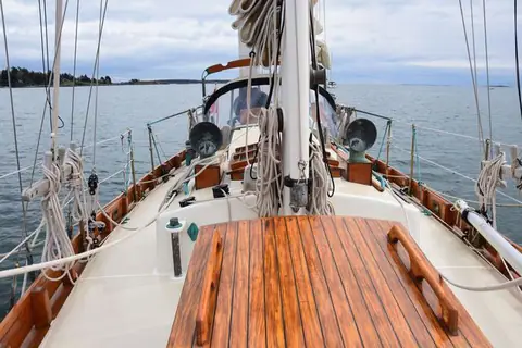 Teak deck and cutter rig of a Bristol Channel Cutter 28 looking forward