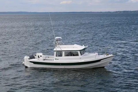 C-Dory 22 Cruiser in profile showing the pilothouse and flat sheer