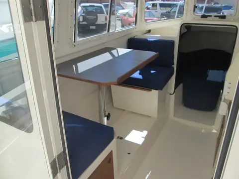 Cabin dinette and forward berth of the C-Dory 22 Cruiser