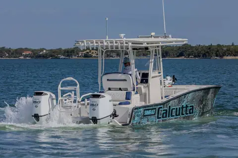 Calcutta 263 seen from the stern quarter with twin Honda 150 outboards