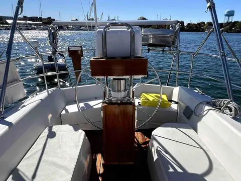Catalina 42 T shaped cockpit with a binnacle, destroyer wheel and cockpit seating