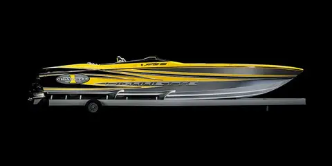 Cigarette 38 Top Gun in side profile on its trailer with yellow and silver graphics