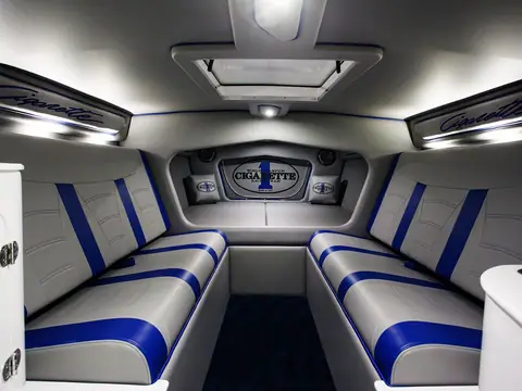 Cigarette 38 Top Gun cabin with facing blue and white upholstered settees
