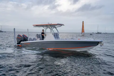 Concept 27 Open in side profile with a gray hull and orange accent stripe