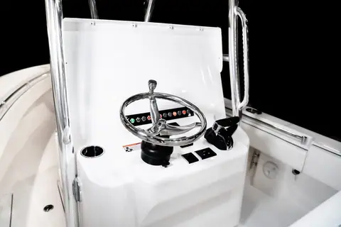 Contender 25T center console helm with stainless wheel and switch panel