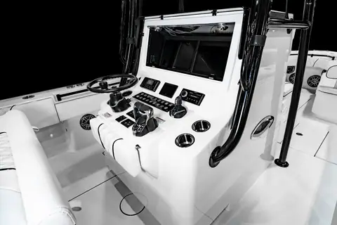 Contender 32 ST console with helm, flush electronics panel and footrest