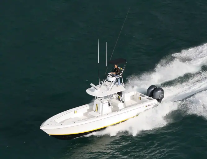 Contender 35 ST running at speed with twin outboards seen from above