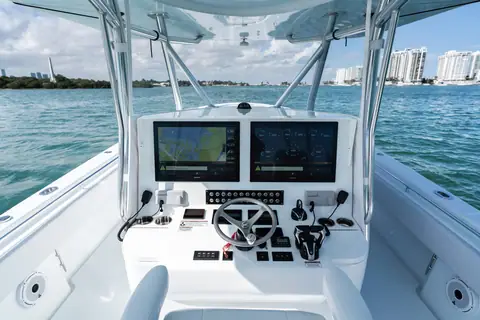 Contender 44 ST helm with twin multifunction displays and wheel