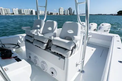 Contender 44 ST helm seating with bolsters and rocket launcher rod holders