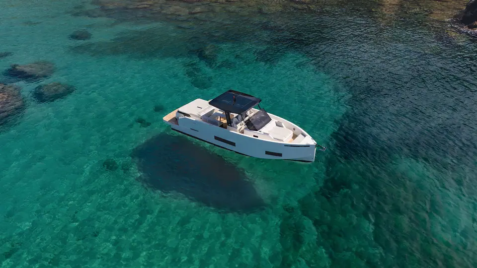 De Antonio D42 Open anchored over clear turquoise water seen from above