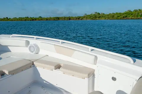 Everglades 243CC bow seating with cushions and a raised gunwale