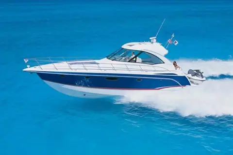 Formula 45 Yacht running with a blue hull seen from the bow quarter