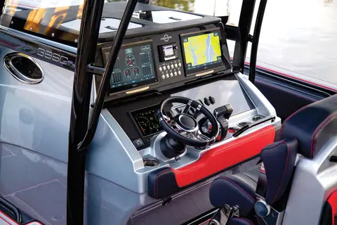Fountain 38 SC helm console with twin displays, wheel and digital throttles