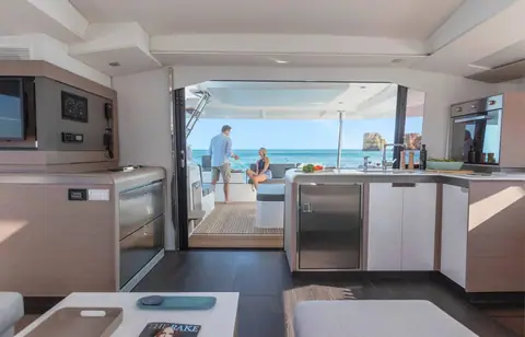 Fountaine Pajot Elba 45 saloon and galley looking aft to the cockpit