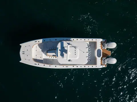 Overhead view of the Freeman 29 deck layout with twin outboards