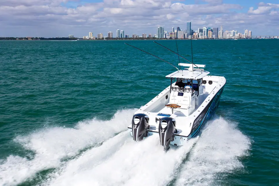 Freeman 37VH running off the Miami skyline seen from astern