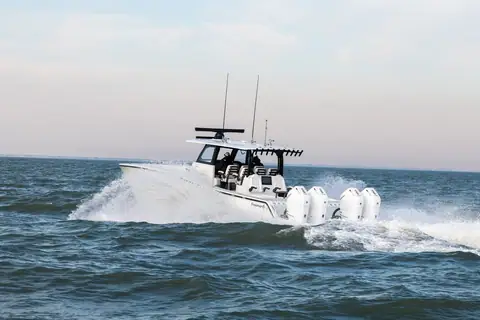 Freeman 43 running at speed with quad outboards