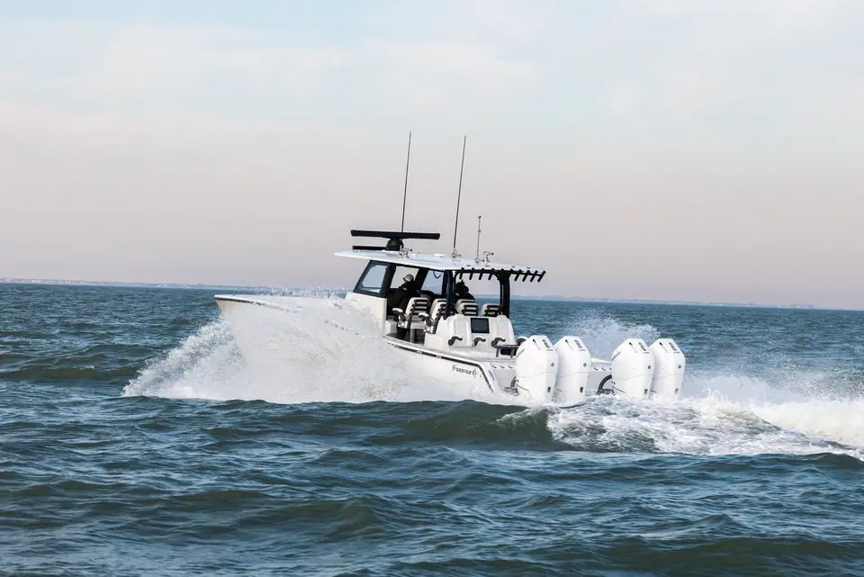 Freeman 43 running at speed with quad outboards