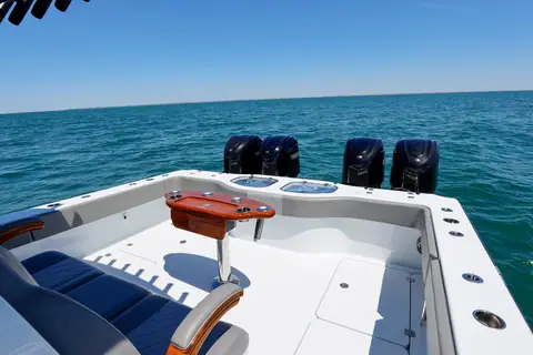 Freeman 43 aft cockpit with a rigging station and four outboards