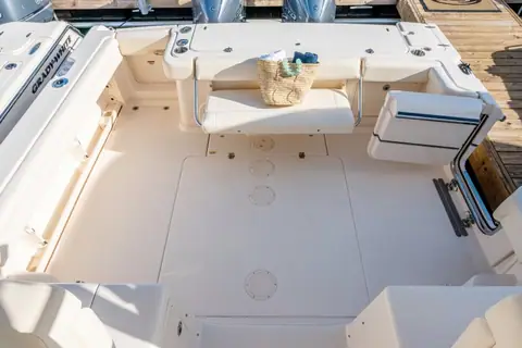 Cockpit of the Grady-White Express 330 with fold down aft bench and transom door