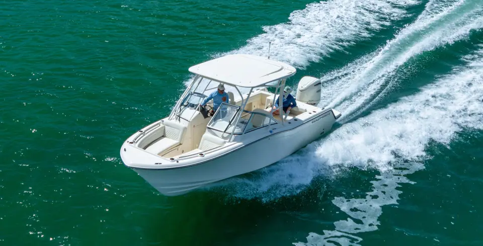 Aerial view of the Grady-White Freedom 235 underway showing the bow seating and hardtop