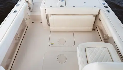 Cockpit of the Grady-White Freedom 235 with fold down aft bench and companion seat