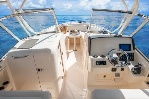 Helm and walkthrough windshield of the Grady-White Freedom 285