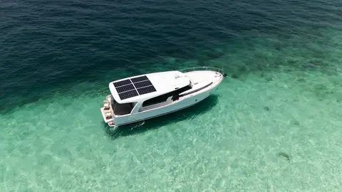 Aerial view of the Greenline 40 at anchor showing the solar panels on the hardtop