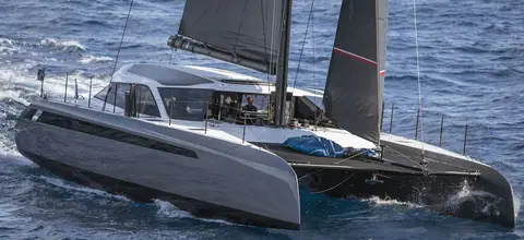 Gunboat 68 catamaran sailing fast under main and jib